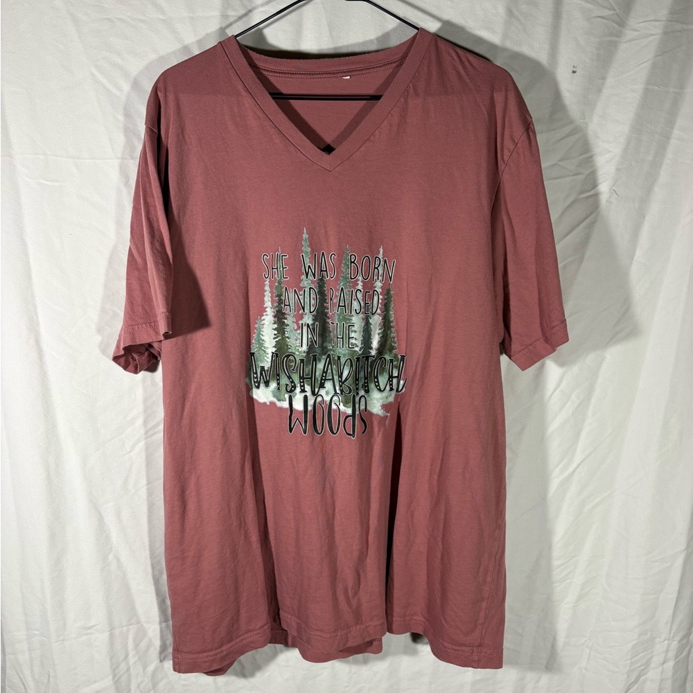 Women’s  Adventure Graphic Tee in Rosewood. ‘Wish a b*tch woods’ are the words.